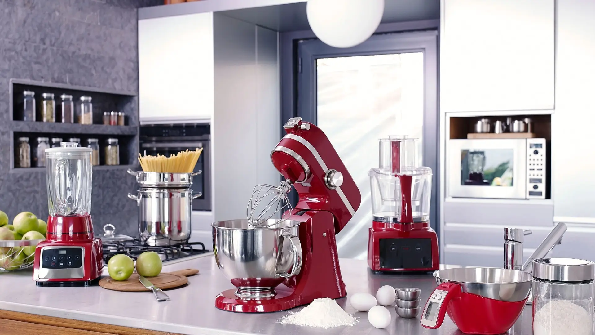 Kitchen island with luxury appliances on top and some ingredients to prepare food.